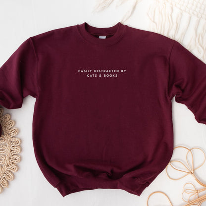 Easily Distracted by Cats and Books Sweatshirt